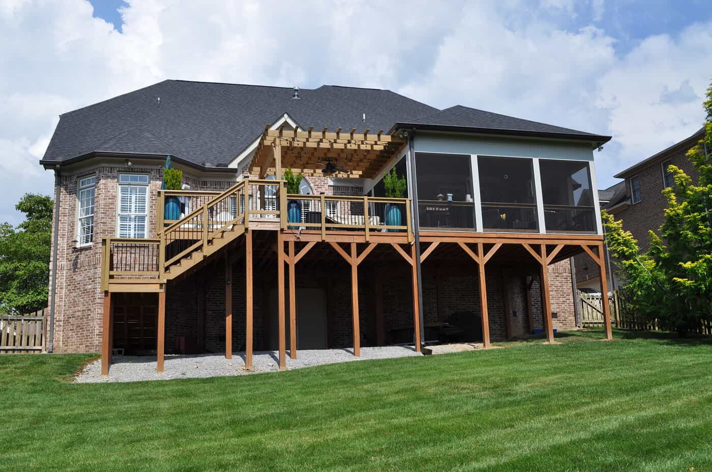 brentwood combination outdoor space with deck porch and pergola 
